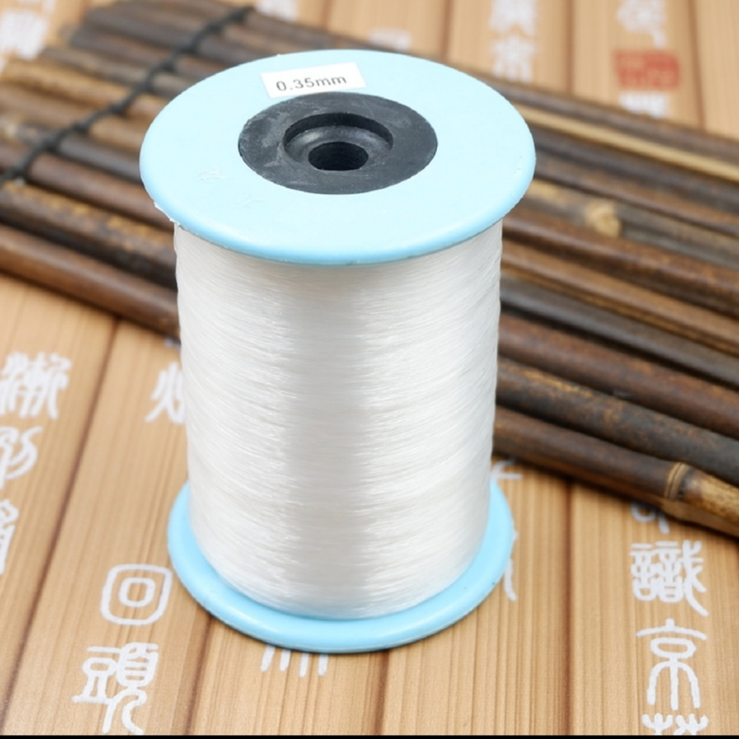 Large roll 0.35mm non-stretch fishing line wrapped ring line Transparent fish silk line DIY hand-woven paper towel box beaded fish