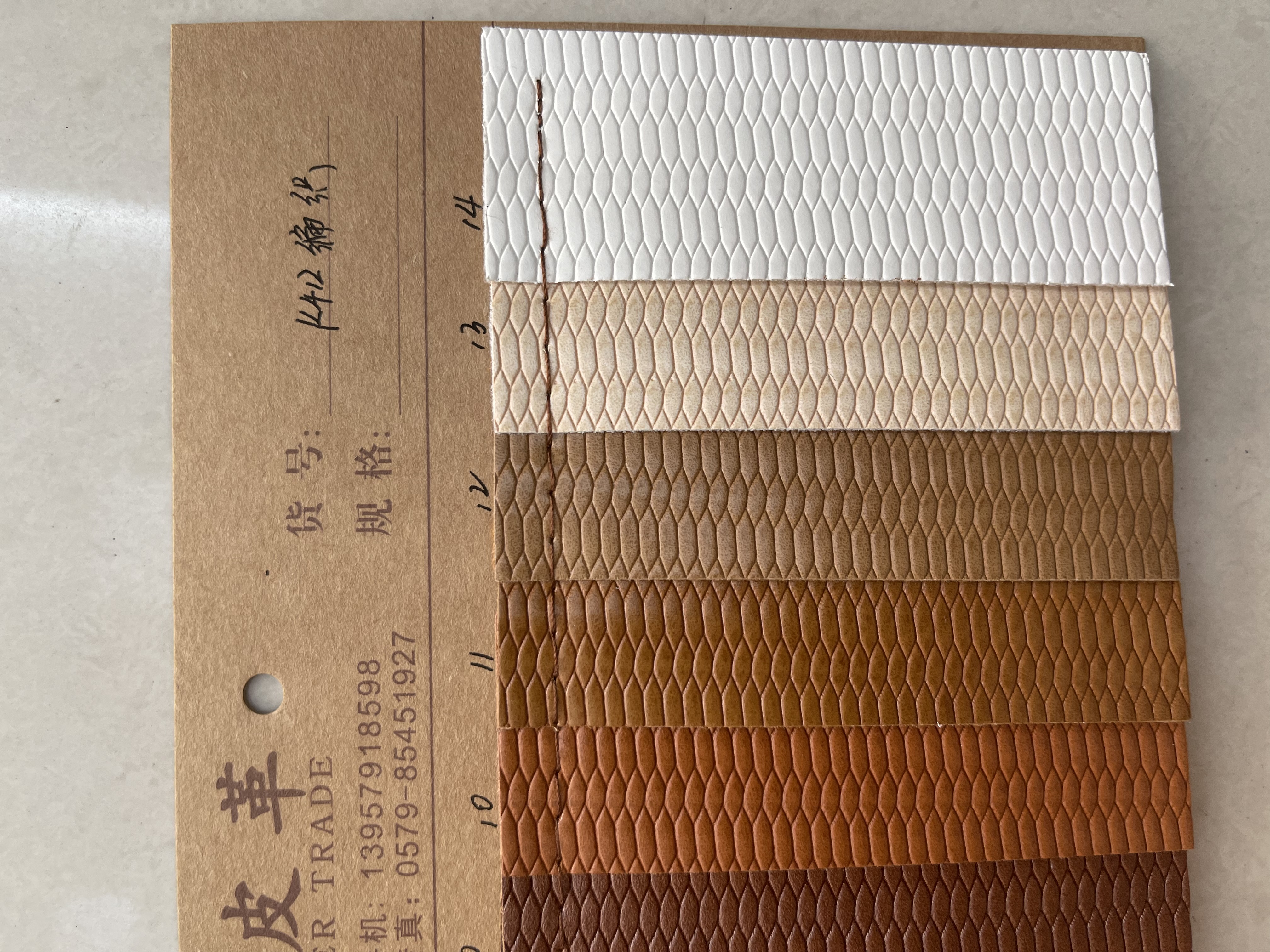 K412编织大量现货高中低档皮革面料厂家直销热销新款白底实物图