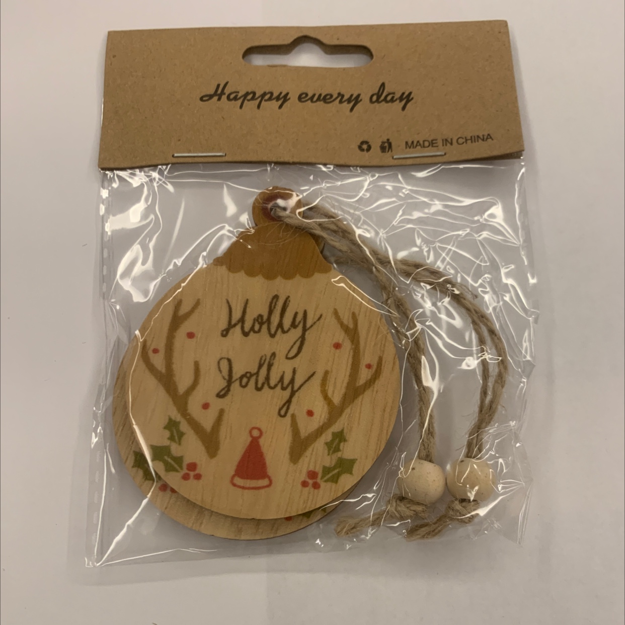 Grey background with color-printed Christmas hemp rope, two strings of natural wood-colored wood beads, one package, gift decoration, wooden 27