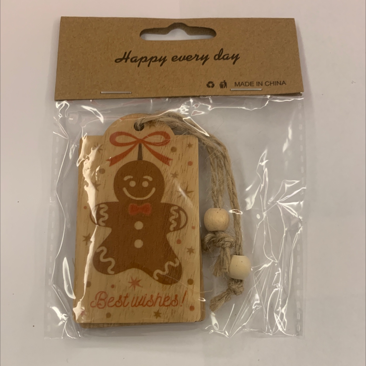 Grey background with color-printed Christmas hemp rope, two strings of natural wood-colored wood beads, one package, gift decoration, wooden 97