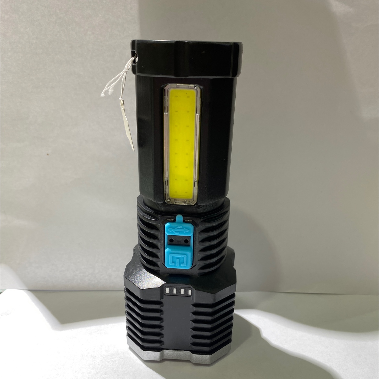 The new black flashlight has high brightness