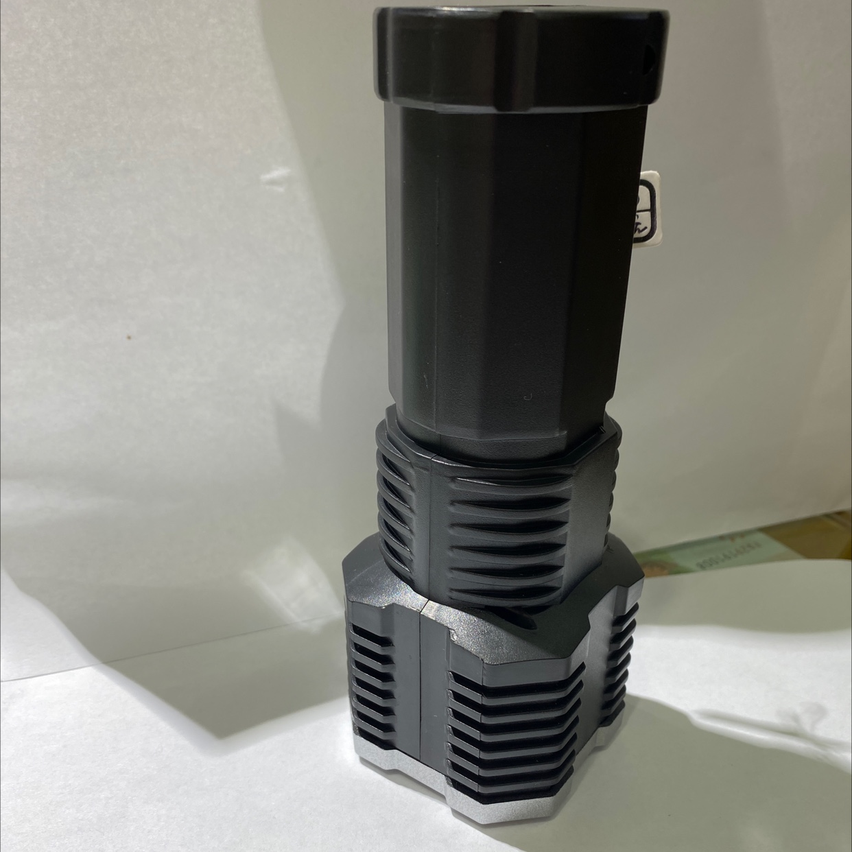 The new black flashlight has high brightness details Picture