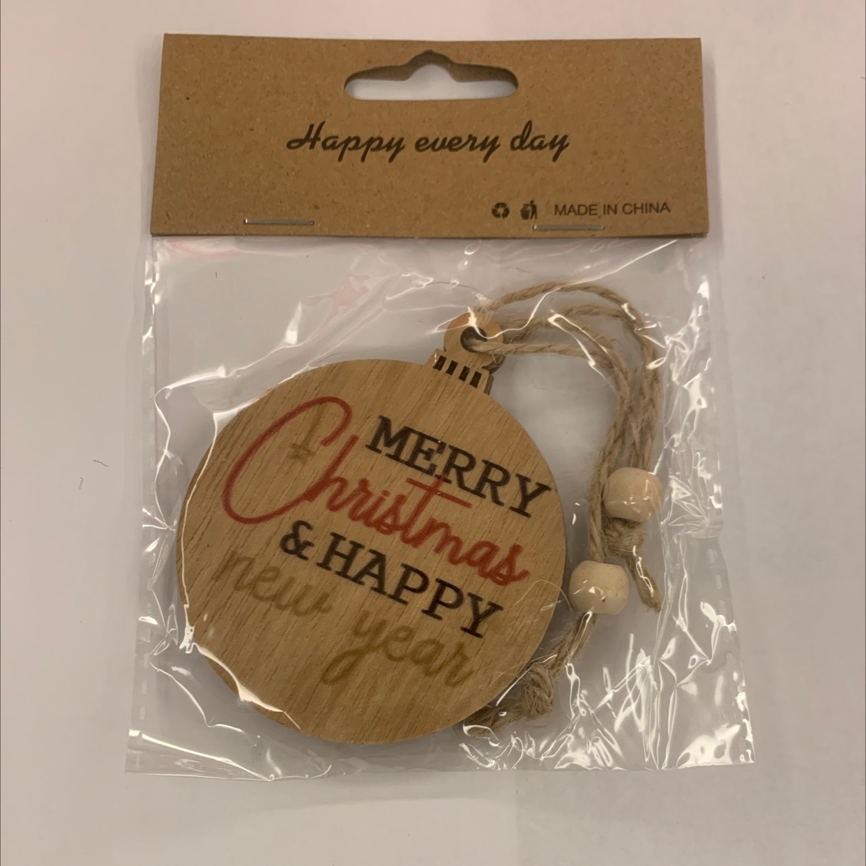 Grey background with color-printed Christmas hemp rope, two strings of natural wood-colored wood beads, one package, gift decoration, wooden 114