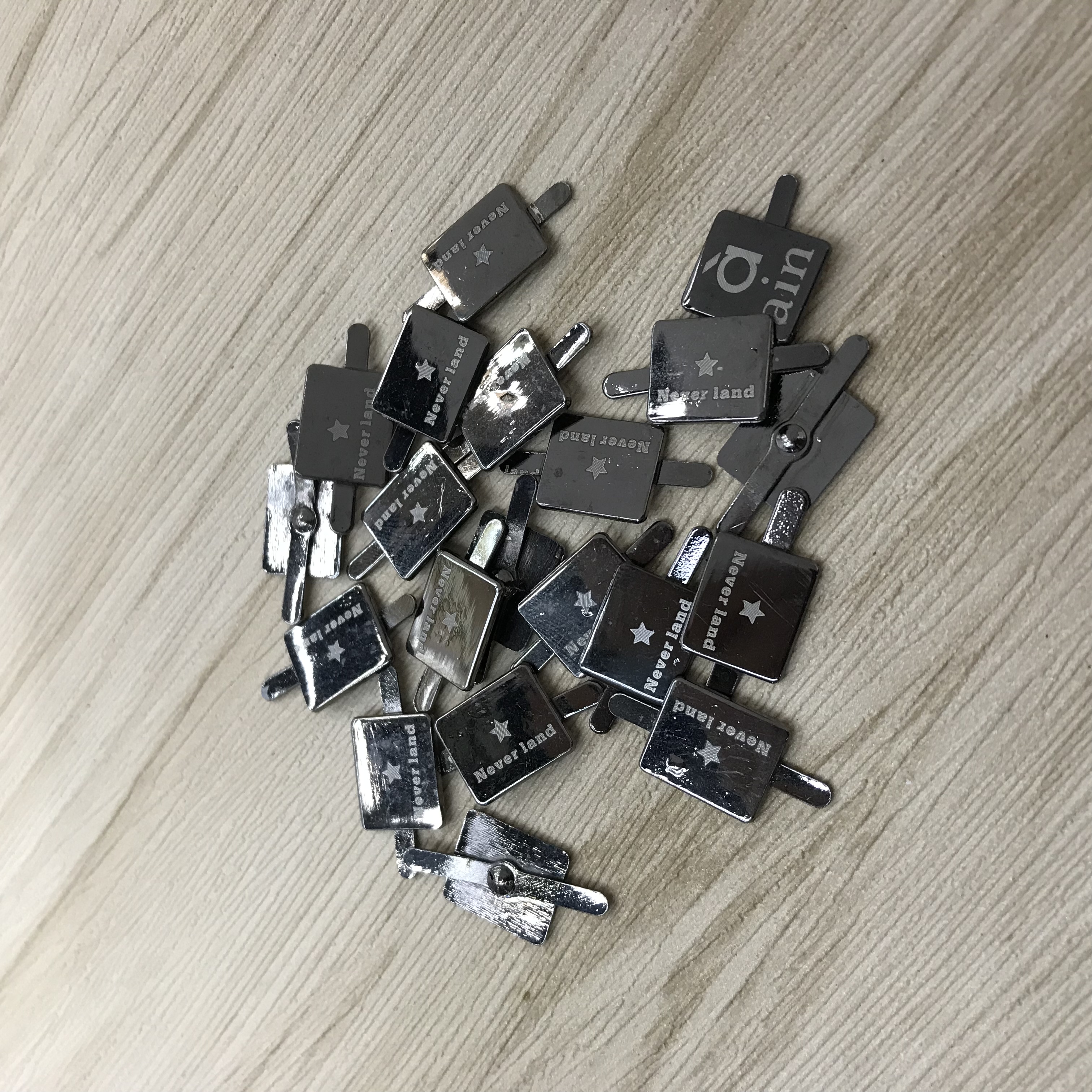Laser marking of alloy for clothing accessories details Picture