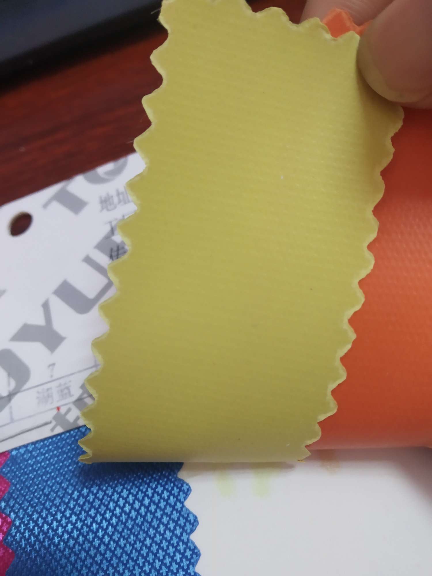 TY-- 019 Cross Jacquard glossy pvc 8# Golden yellow details Picture