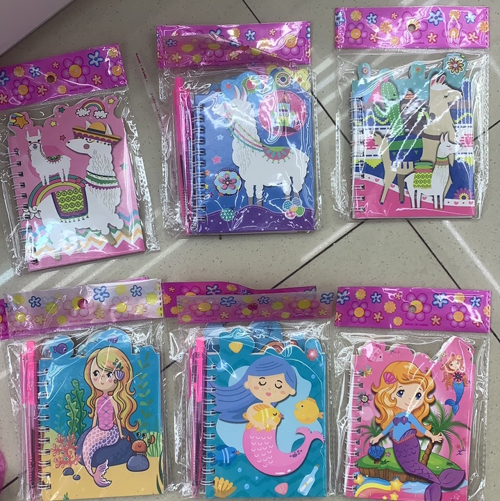 Cartoon coil notebook with pen thumbnail