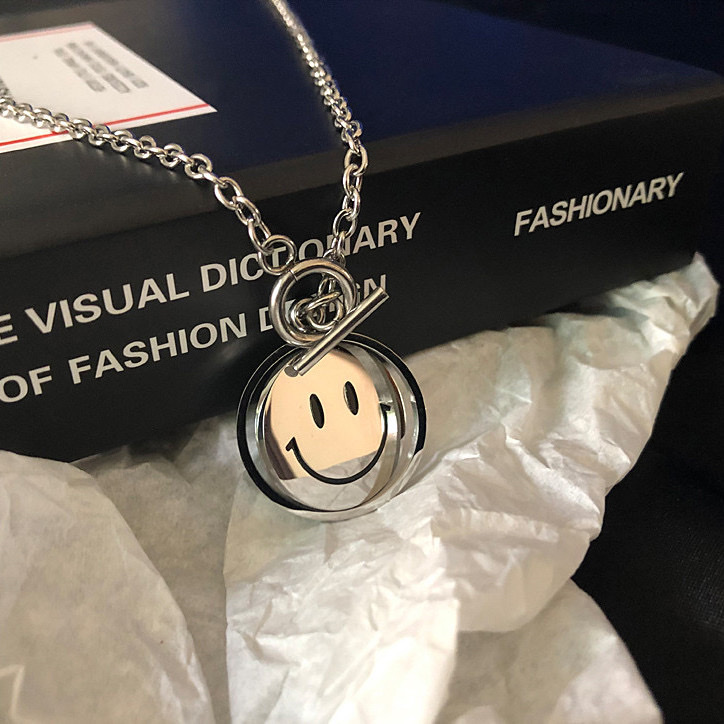 A retro and unique hip-hop couple necklace with a simple and stylish InS-style rotating smiling face pendant for both men and women that never fades details Picture