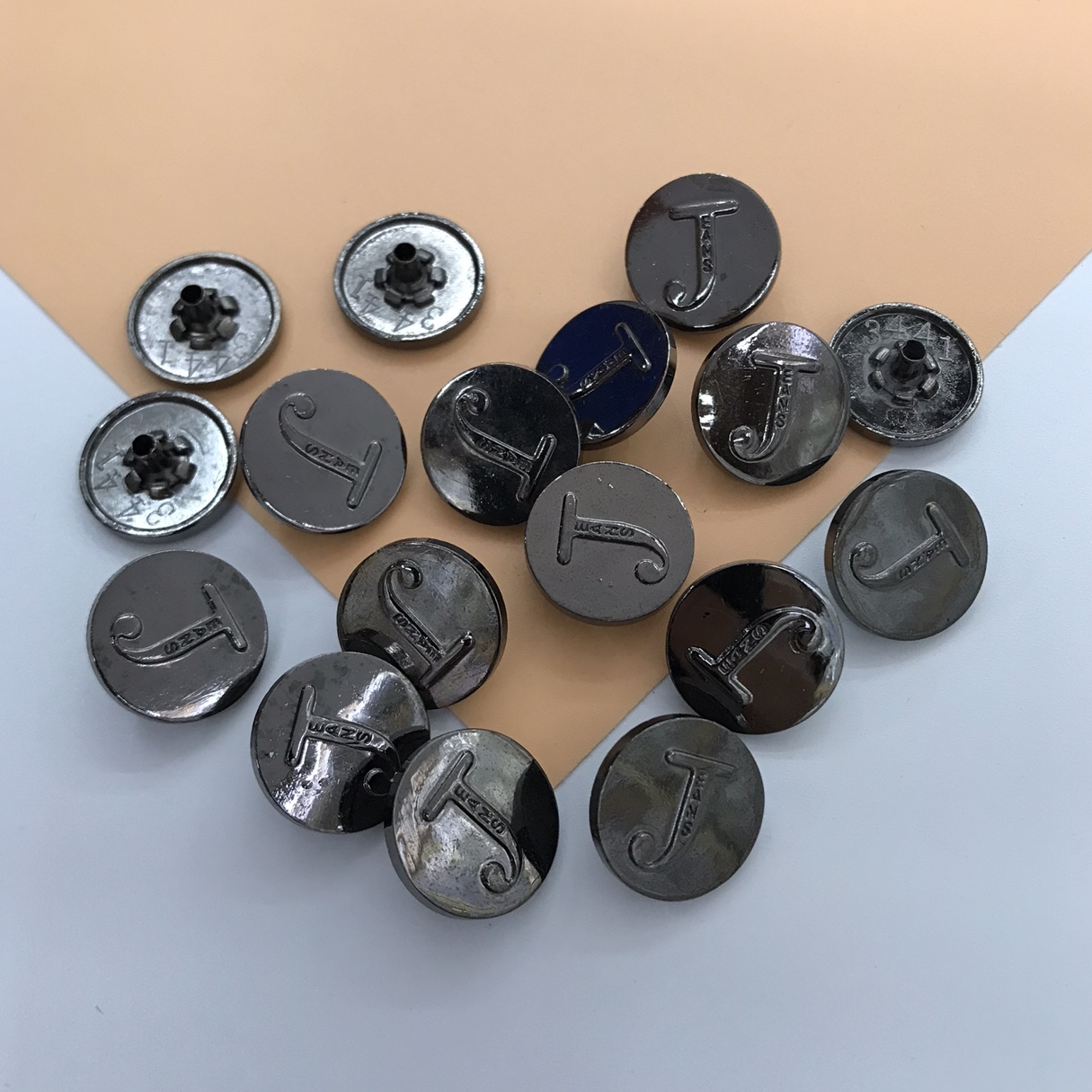 Clothing accessories, overcoats, jackets, buttons, four-way buttons, snap buttons and decorations