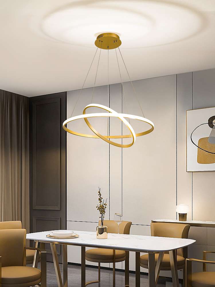 Modern and simple trendy lighting fixtures: The main light in the living room, the large light in the dining room, the grand three-ring dining table, the dining room, and the bedroom chandeliers are all golden details Picture