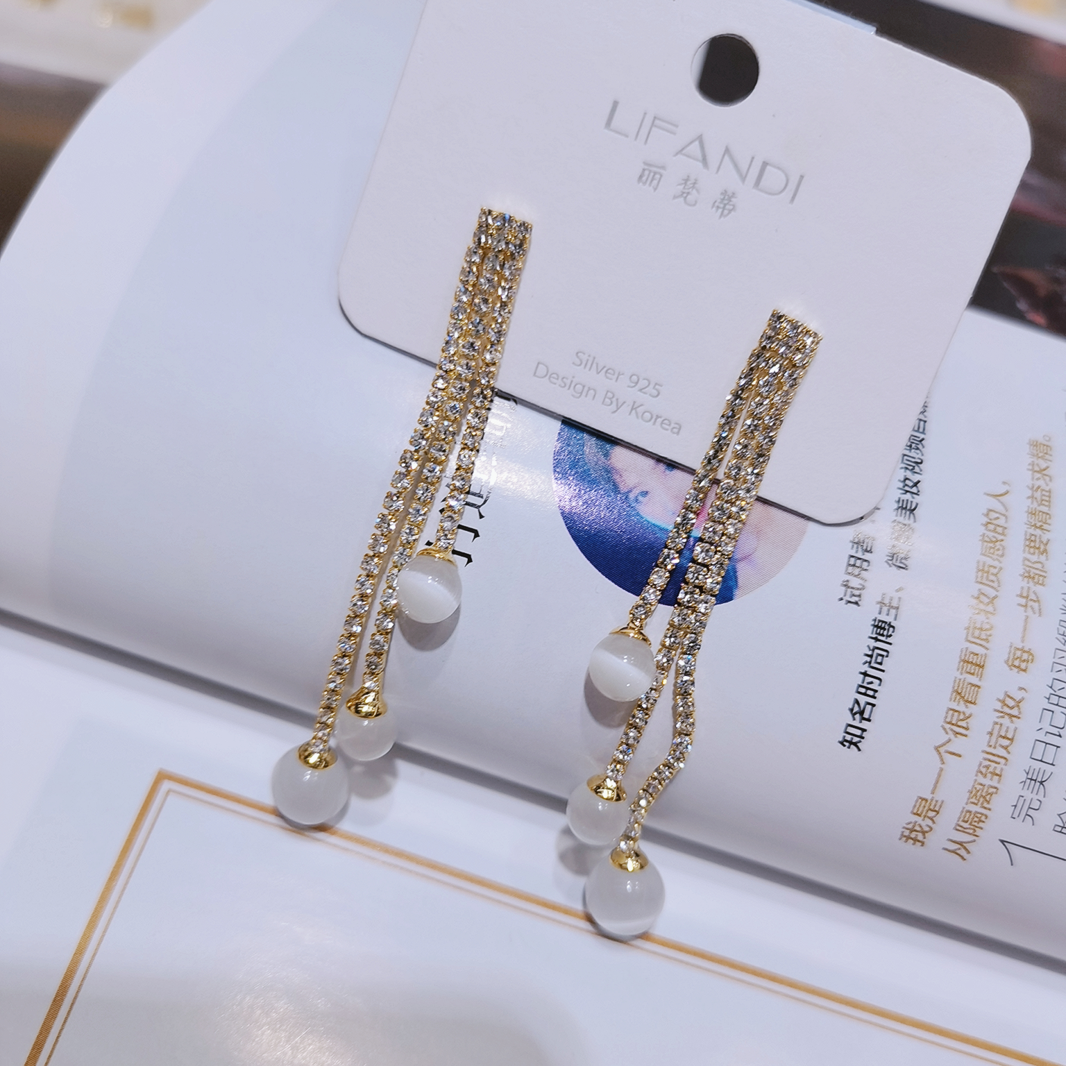 新款简约显脸瘦猫眼流苏长款耳坠百搭耳环S925银针