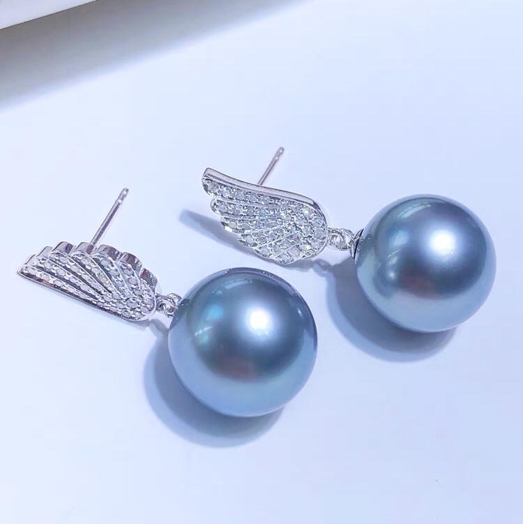 Pearl studs and diamond earrings for women