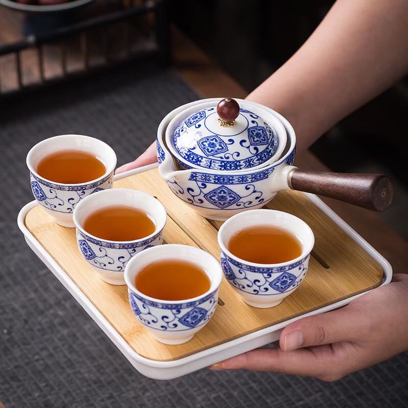 Kun Kun Ceramics' best-selling portable tea Set: One pot, four cups, 360-degree Rotating teapot, Travel set, Lazy person's teapot, essential for Camping 118 details Picture