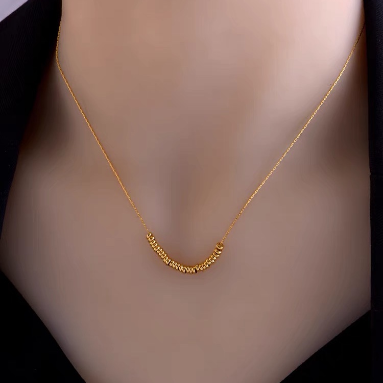 Bathing without picking temperament bead necklace ins senior sense original design small golden bean clavicle chain titanium steel woman