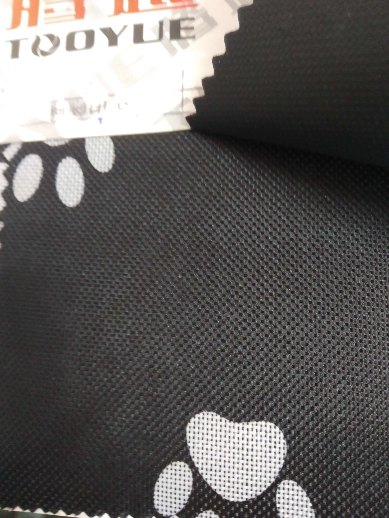 TY---033-3   600D印花宠物系列   2#狗脚印少白底实物图