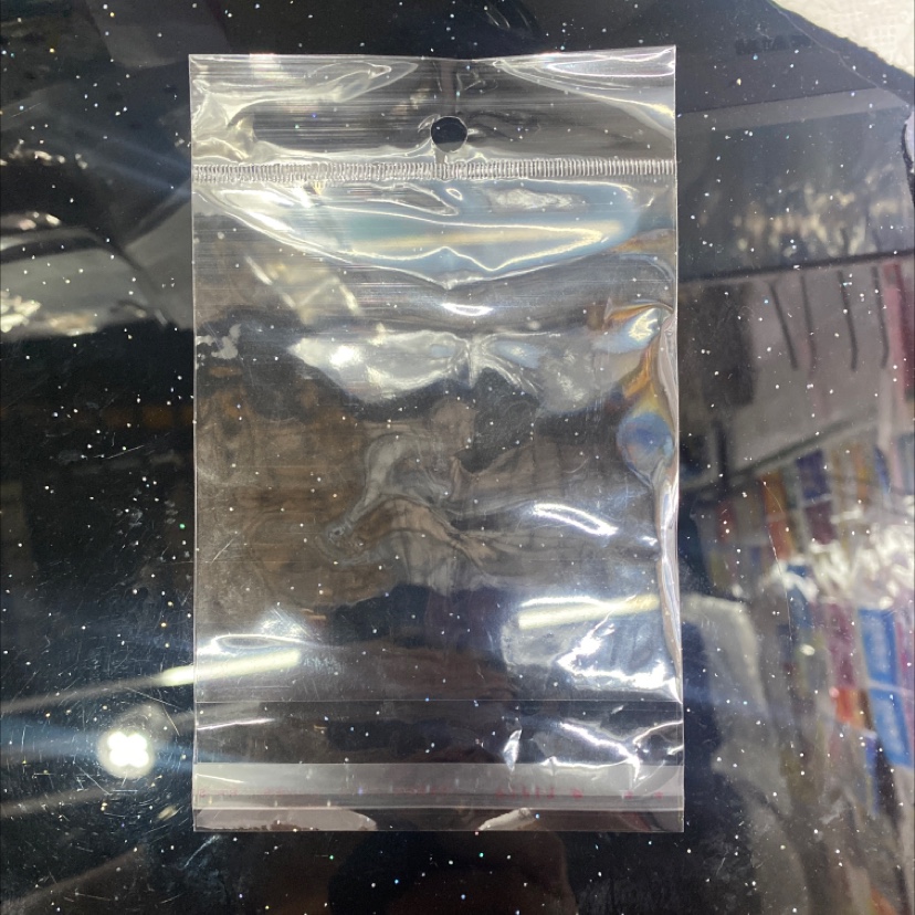 Transparent card head perforated bag