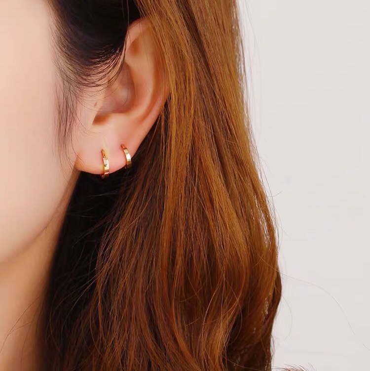 Earrings, clasp, and hoops are classic
