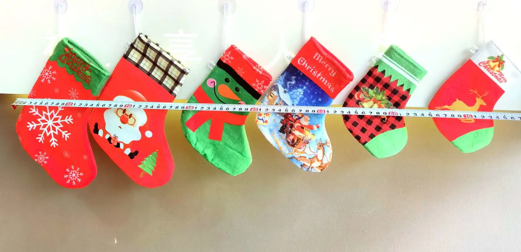 Calcetines navideños bolsillos de regalo navideños bolsillos de dinero santa calcetines navideños colgantes de ventosa monederos navideños detail image 7