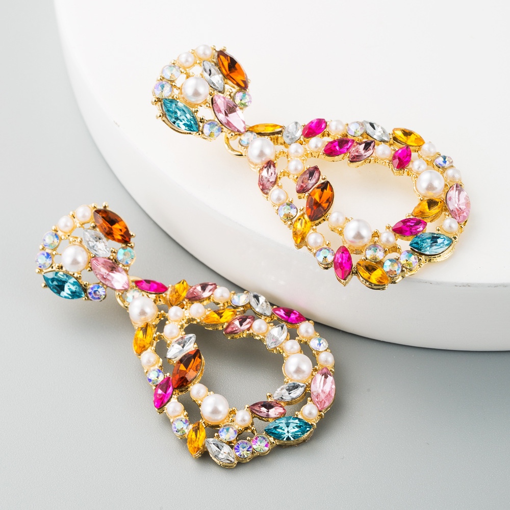 High-end, elegant and fashionable new hollowed-out water drop pearl and glass exaggerated earrings