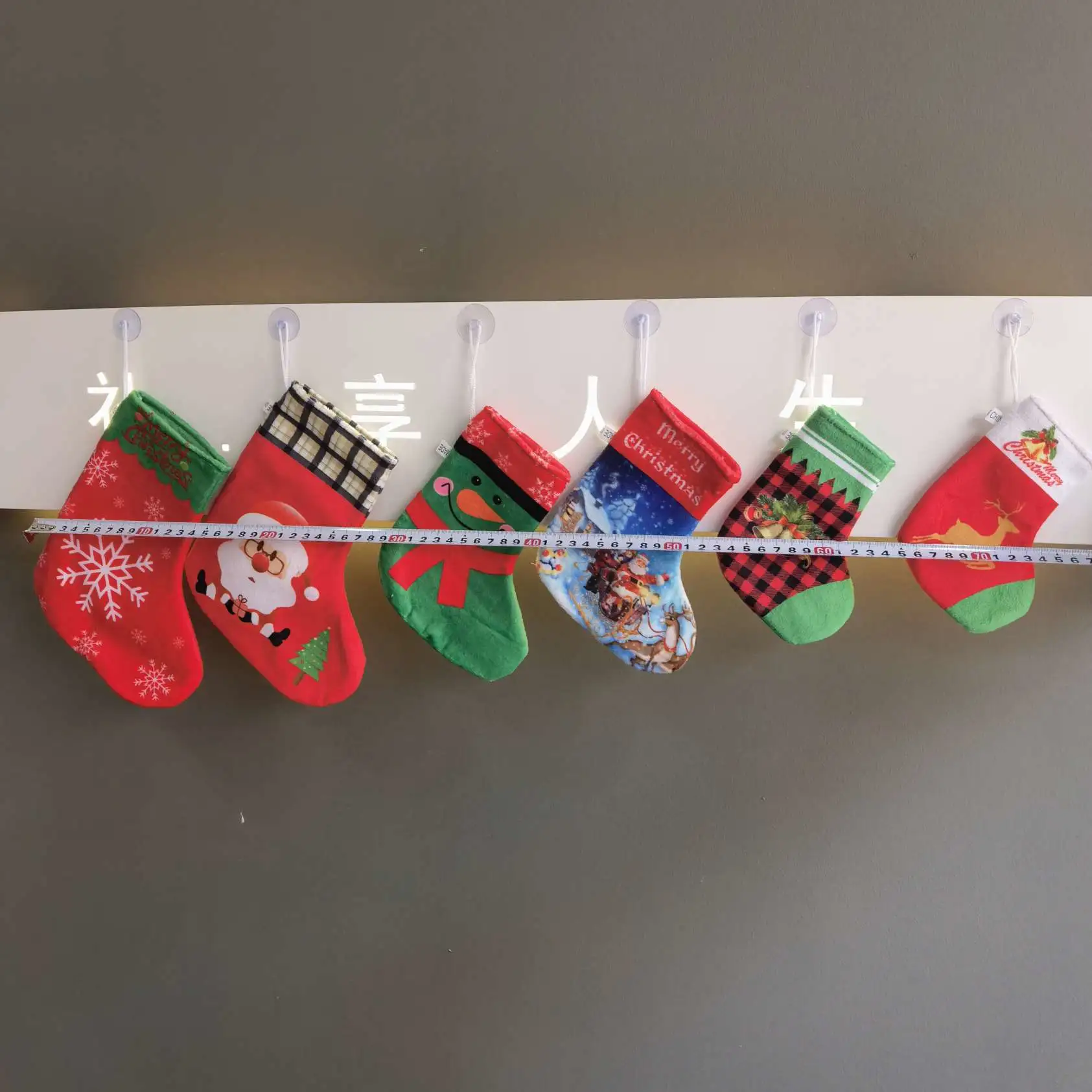 Calcetines navideños bolsillos de regalo navideños bolsillos de dinero santa calcetines navideños colgantes de ventosa monederos navideños detail image 3