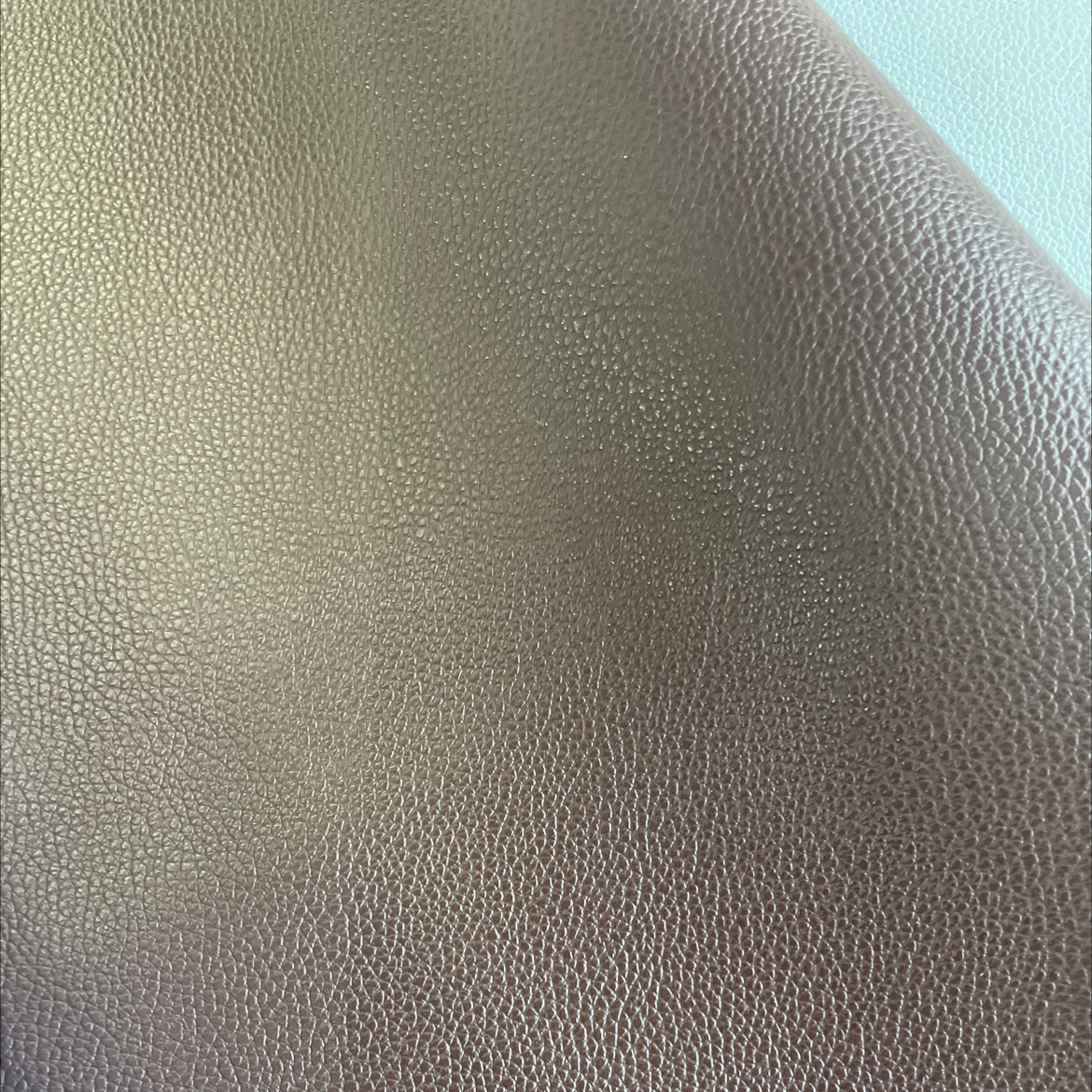 Mini lychee leather fabric, leather bags, sofa belts, soft furnishings, stationery, coffee mnlz003 Application Scenario