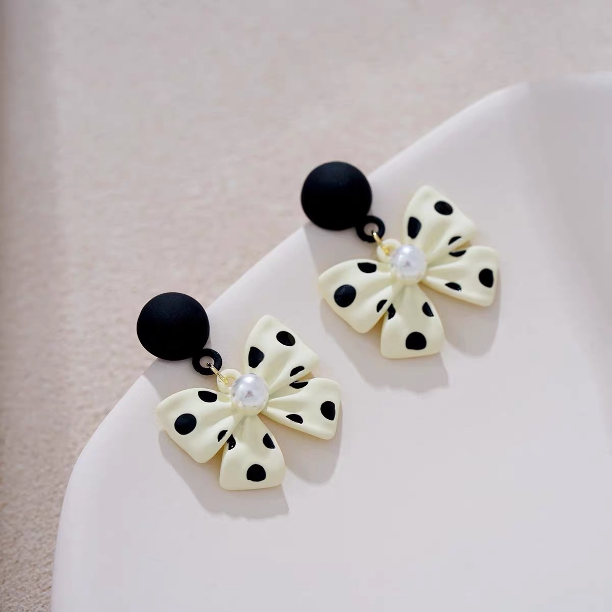 Retro polka dot bow, a unique and gentle design, black butterfly earrings 1, Jieya steel jewelry detail image 3