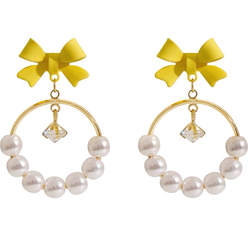 Light yellow bow ear earrings with a unique design sense, French retro and high-end style, Jieya steel jewelry detail image 4