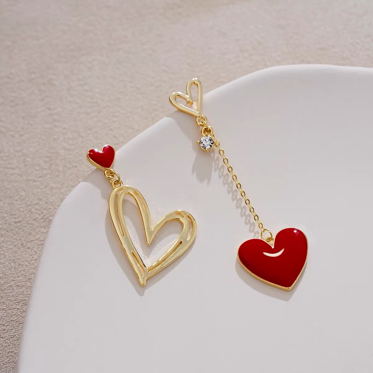 Big red heart-shaped earrings, long tassels, asymmetrical earrings, niche and elegant Jieya steel jewelry detail image 1