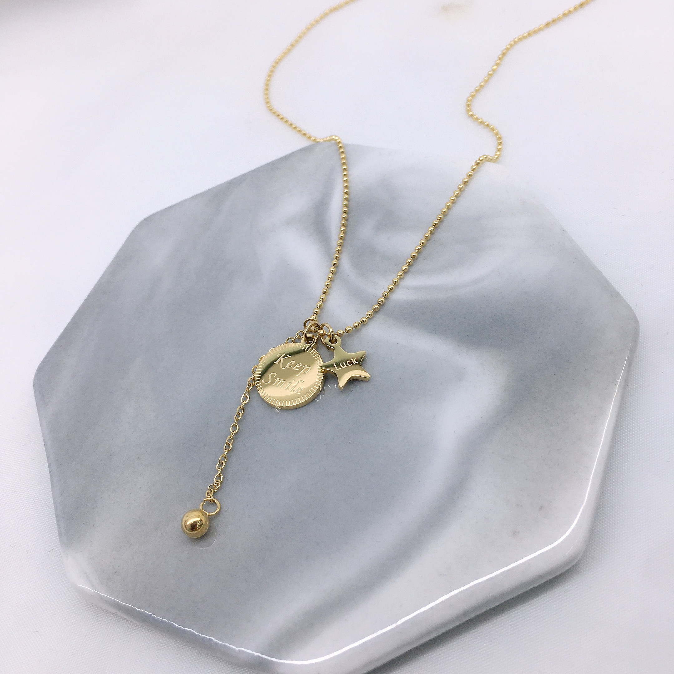 keep+ pentagram necklace on round piece thumbnail