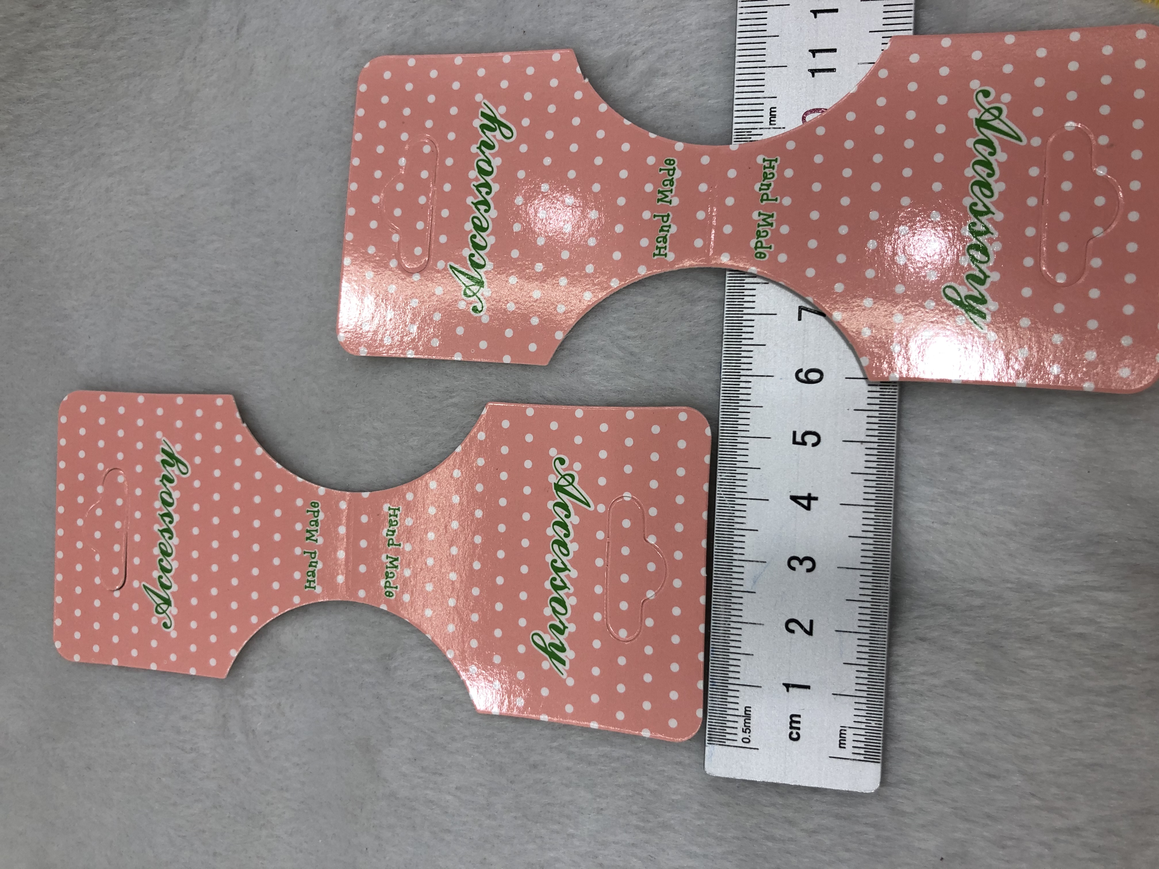 55*132彩色350克白卡印刷吊卡表面腹亮膜详情图3