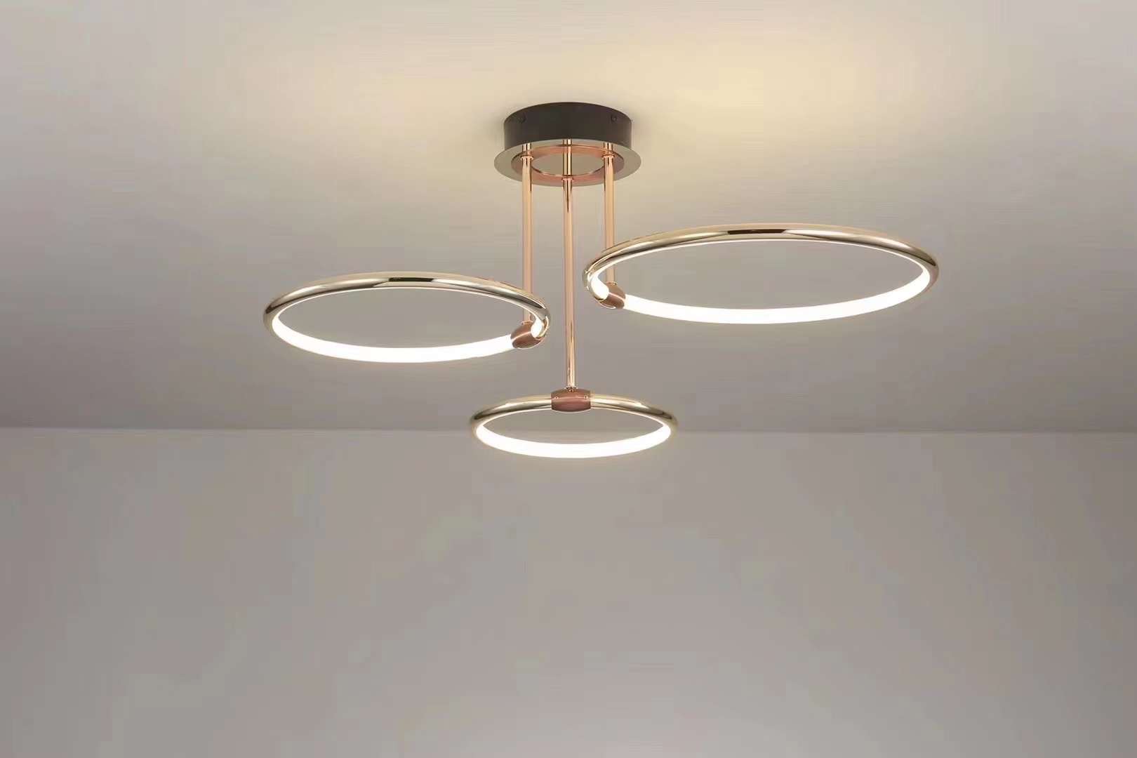 Minimalist and simple living room and room lights with three-color changing light gold details Picture