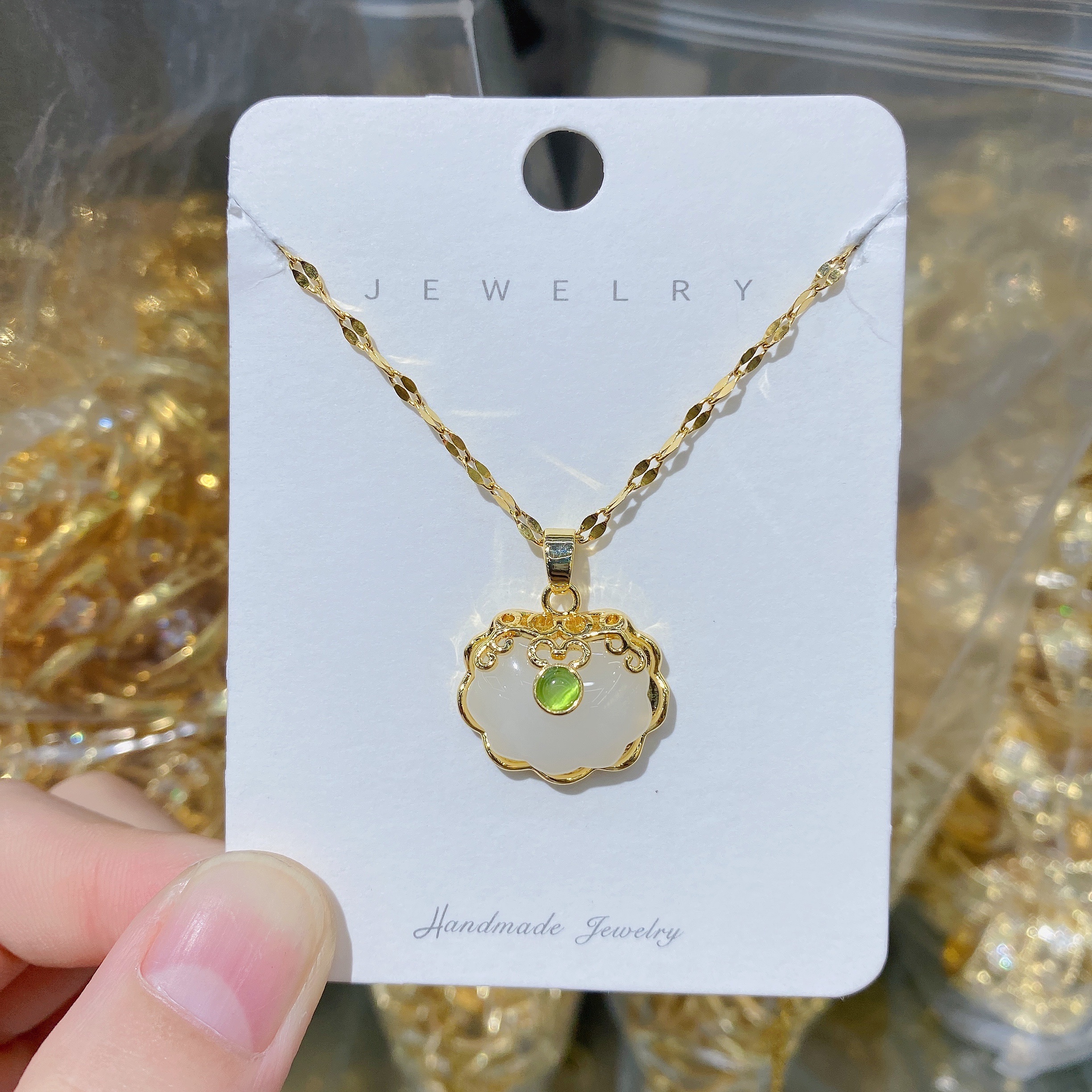 Titanium steel 18K gold imitation Hetian jade peace lock pendant resin necklace, women's gold inlaid jade longevity lock pendant collarbone chain (single pendant without chain) details Picture