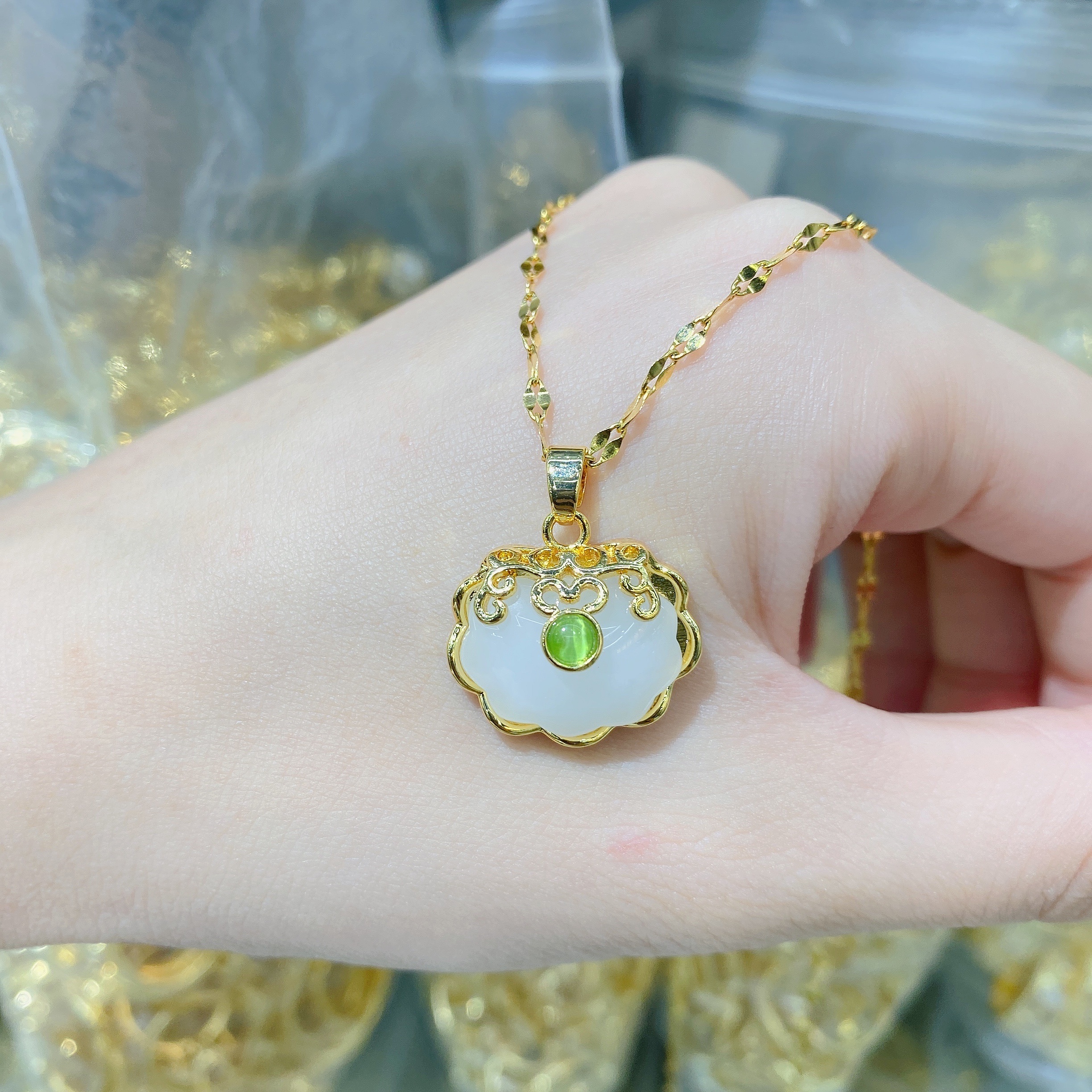 Titanium steel 18K gold imitation Hetian jade peace lock pendant resin necklace, women's gold inlaid jade longevity lock pendant collarbone chain (single pendant without chain) Application Scenario