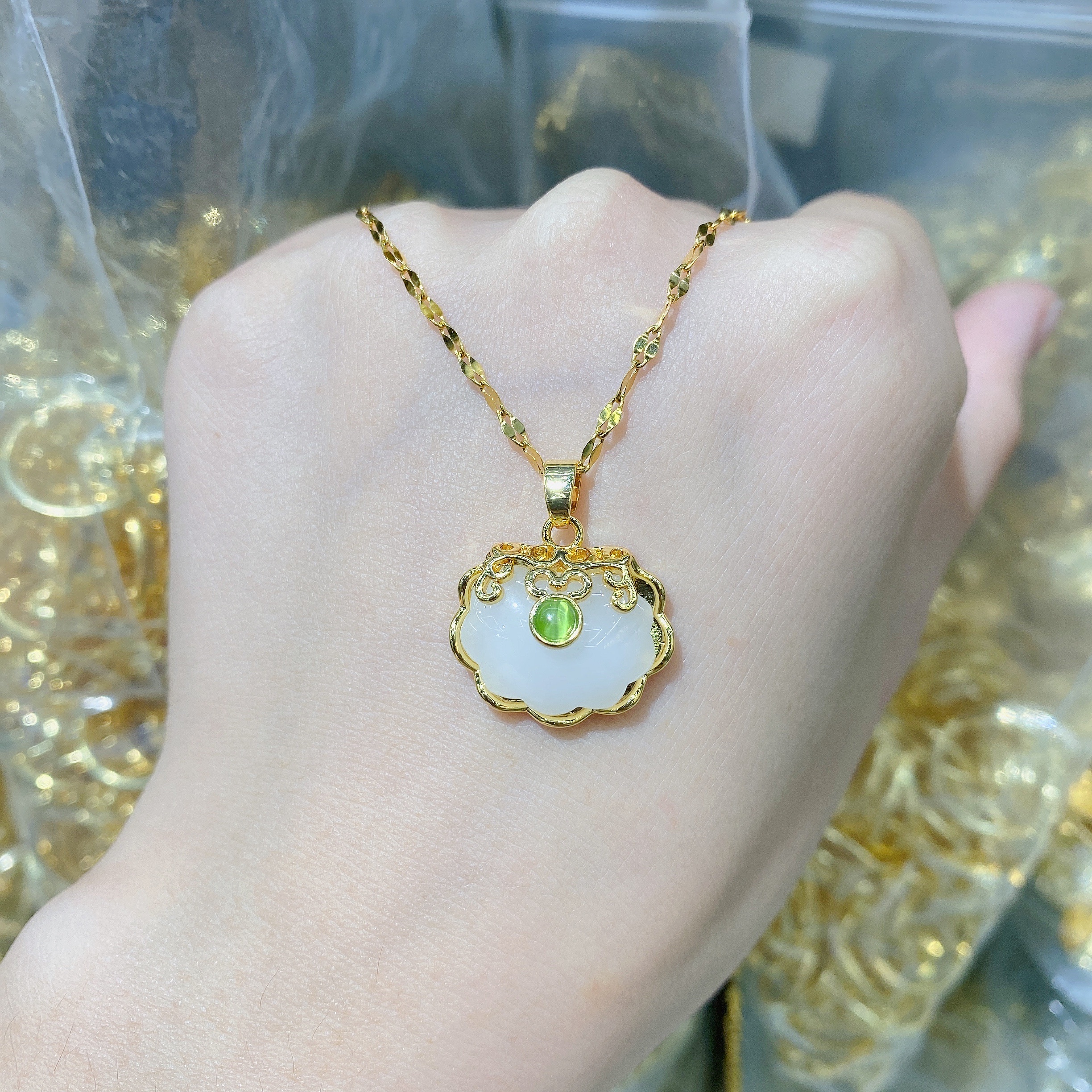 Titanium steel 18K gold imitation Hetian jade peace lock pendant resin necklace, women's gold inlaid jade longevity lock pendant collarbone chain (single pendant without chain) Specification image