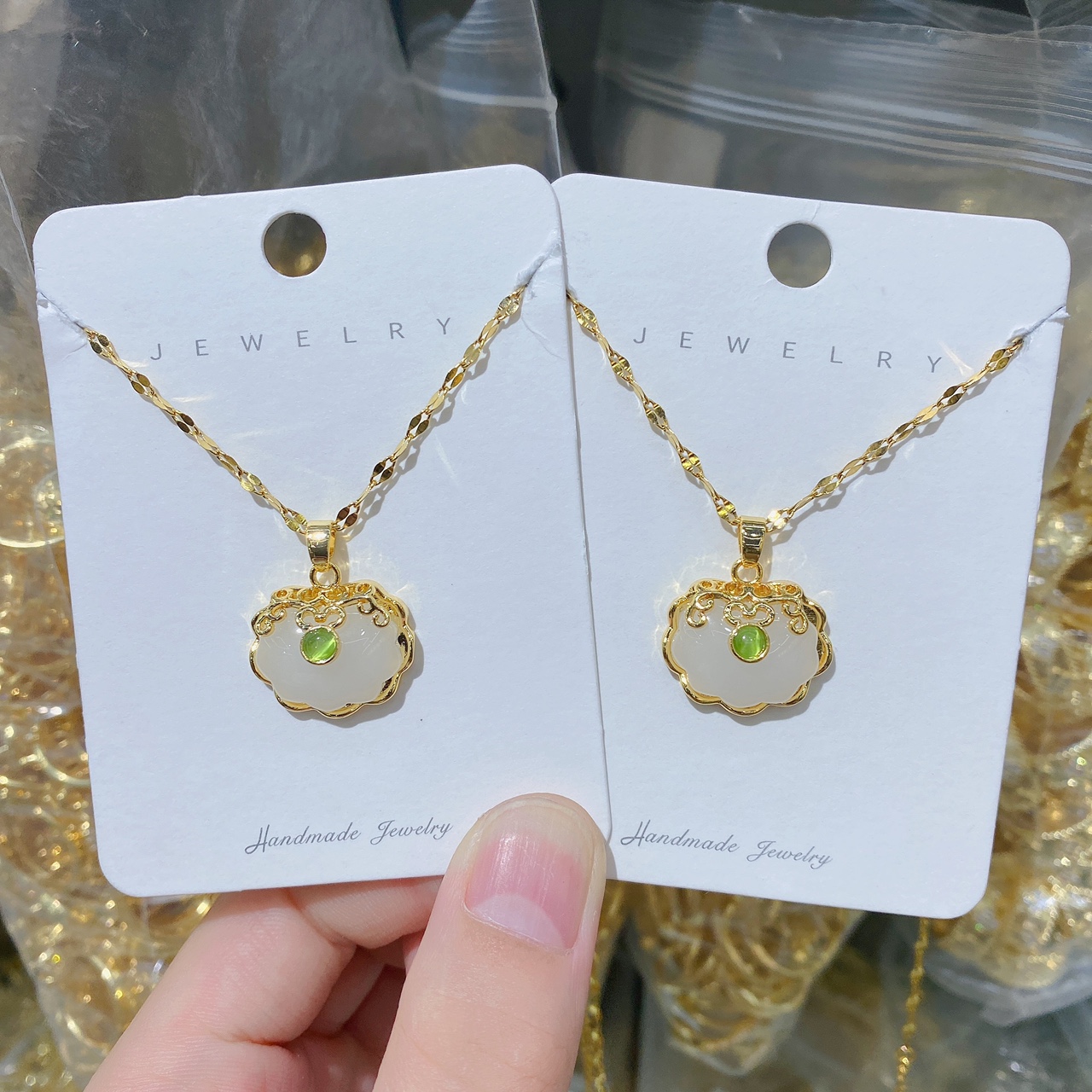 Titanium steel 18K gold imitation Hetian jade peace lock pendant resin necklace, women's gold inlaid jade longevity lock pendant collarbone chain (single pendant without chain)