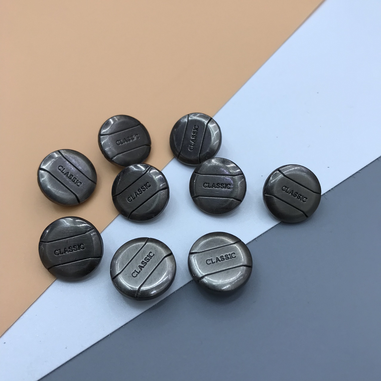 Alloy buttons and four-way buttons for clothing accessories