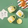 雷沃陶瓷36052店可爱黄鸭杯想你鸭早餐杯子带盖带勺卡通杯子产品图