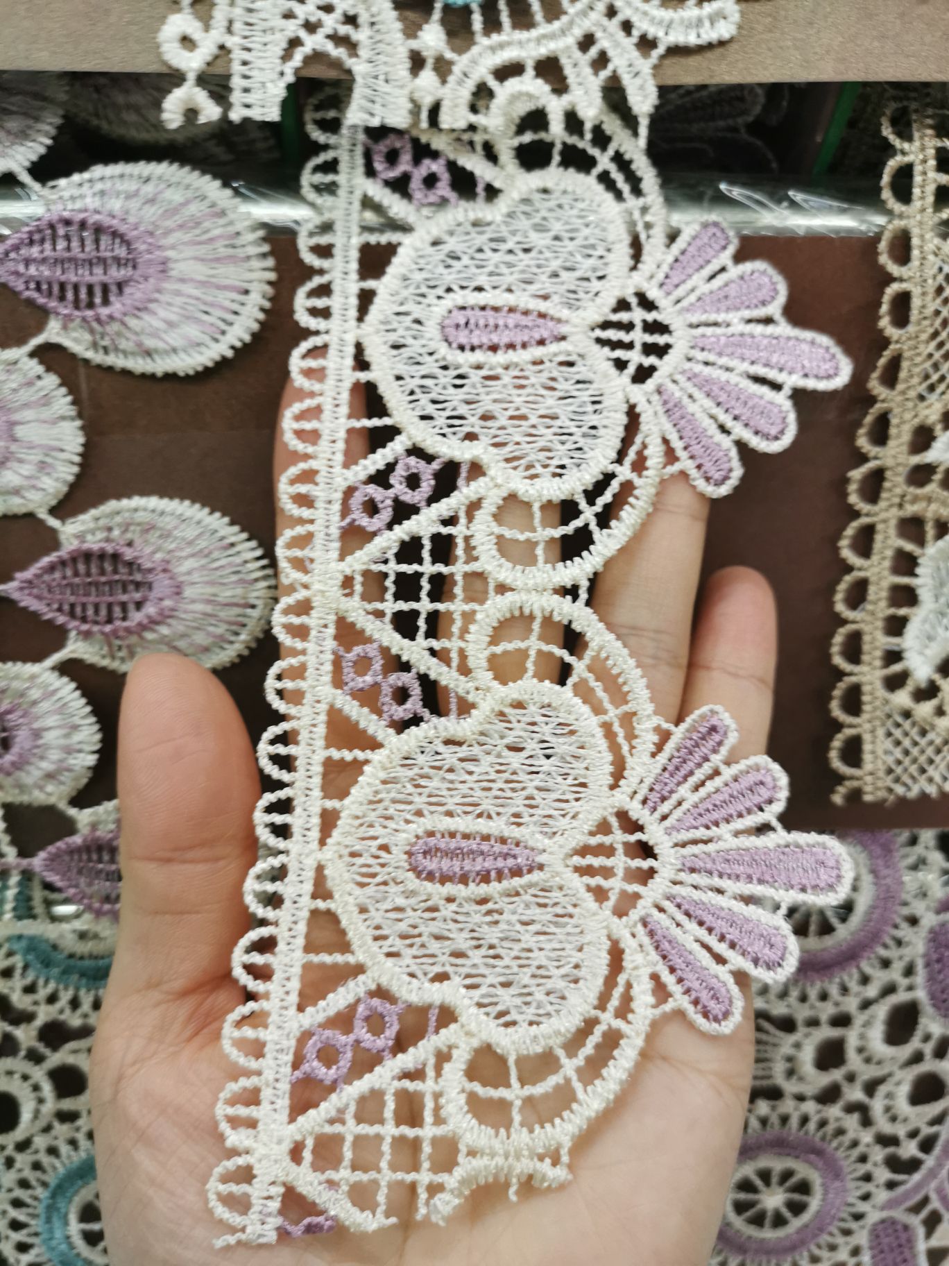 two-tone lace finished garment display
