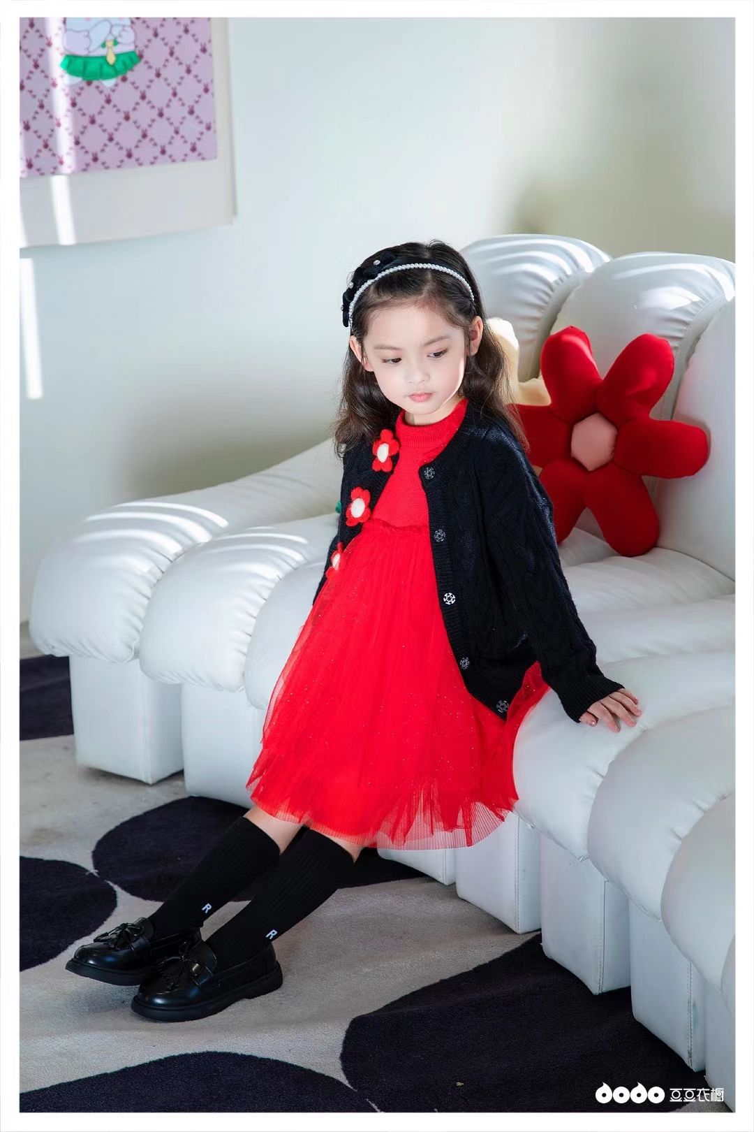 Kids wearing cozy autumn and winter sweater cardigan coat in natural setting