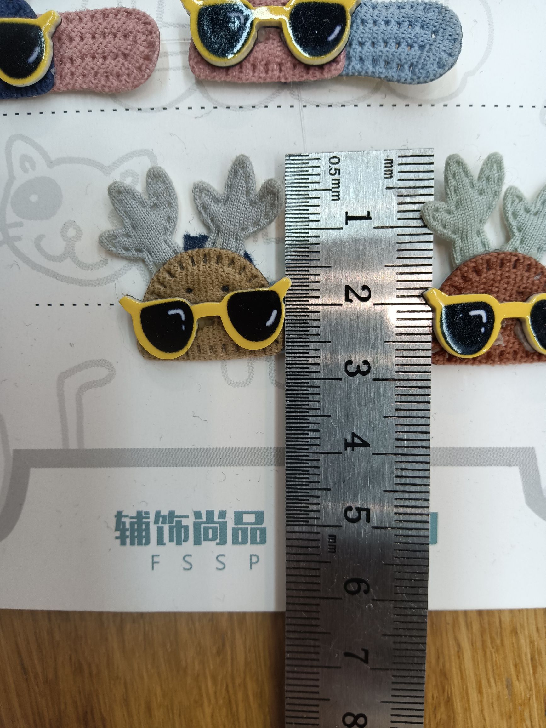 The deer wears sunglasses on its head