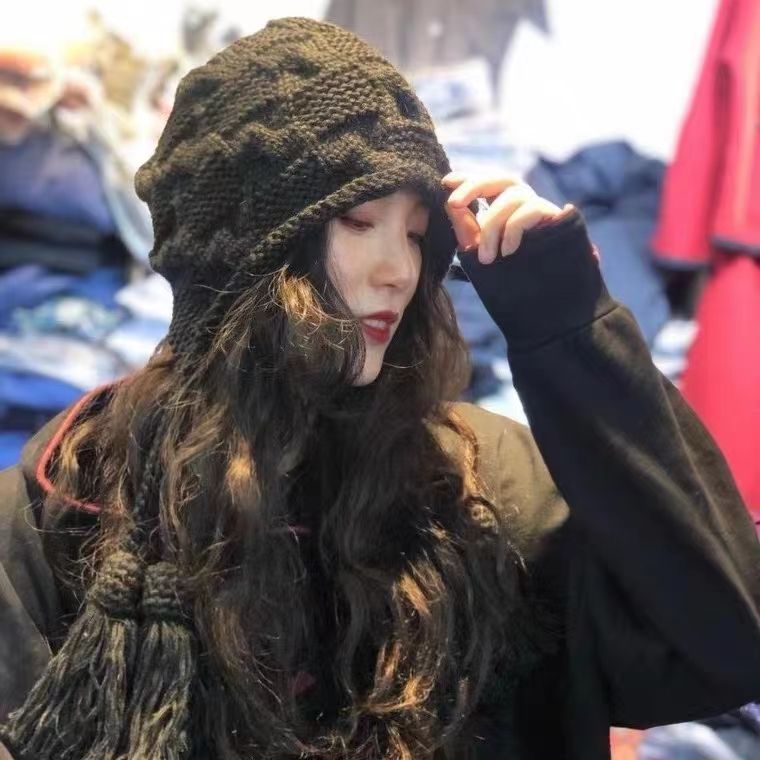 A Knitted Hat With Fringe details Picture