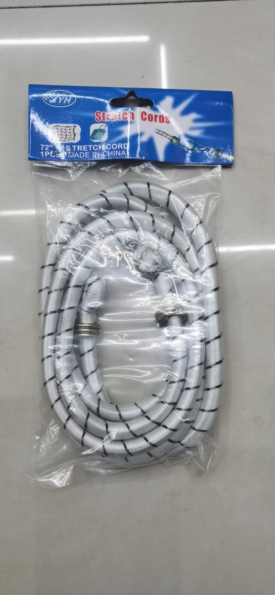 Luggage with elastic cords