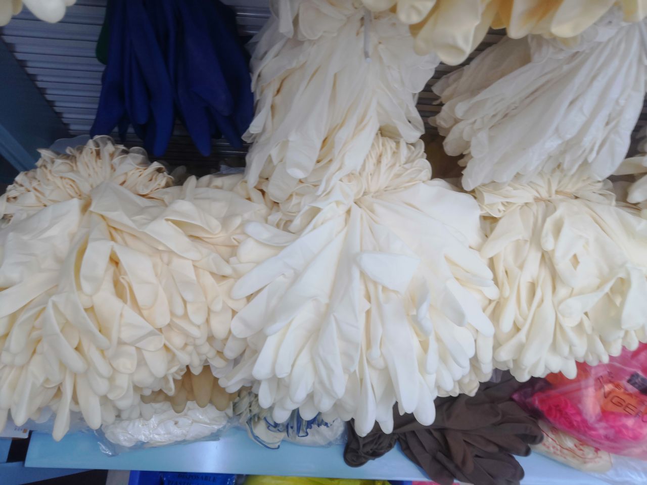 Powder free 12 inch white extra thick latex gloves for both hands thumbnail