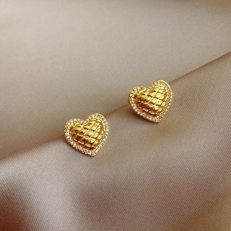 Popular new earrings network explosion heart gold embossed diamond stud earrings