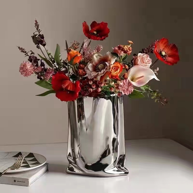 Nordic ceramic electroplated creative geometric silver vases, soft furnishings, wedding and hotel gifts, living room dining table decoration cabinets, entrance hall modern handicrafts, flat vases and flower vases wholesale Item Picture