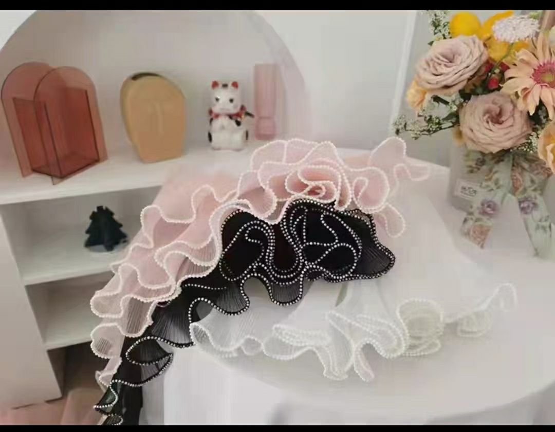 "Pearl Wave Yarn" is available in seven colors undefined