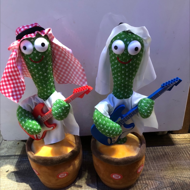 An electric stuffed toy that dances on a cactus with lights and music thumbnail