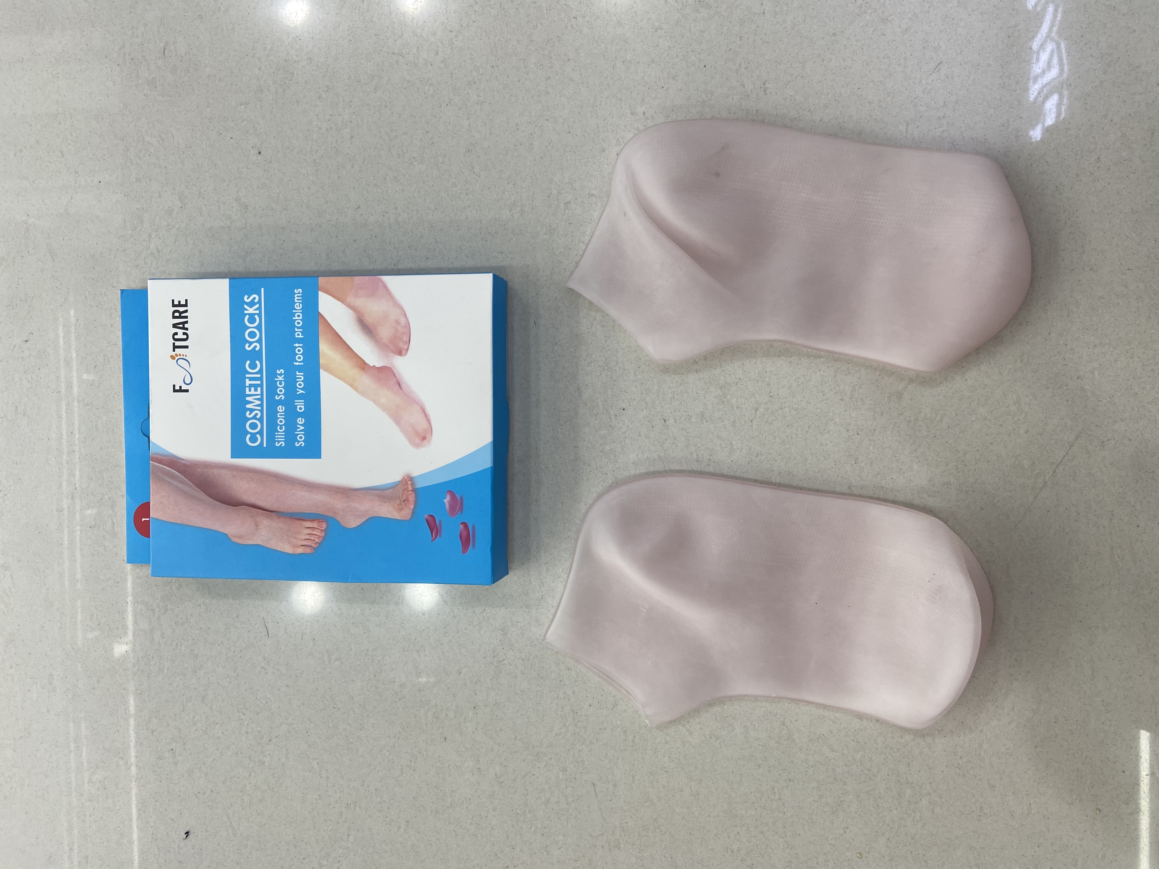 Silicone moisturizing socks in medium tube