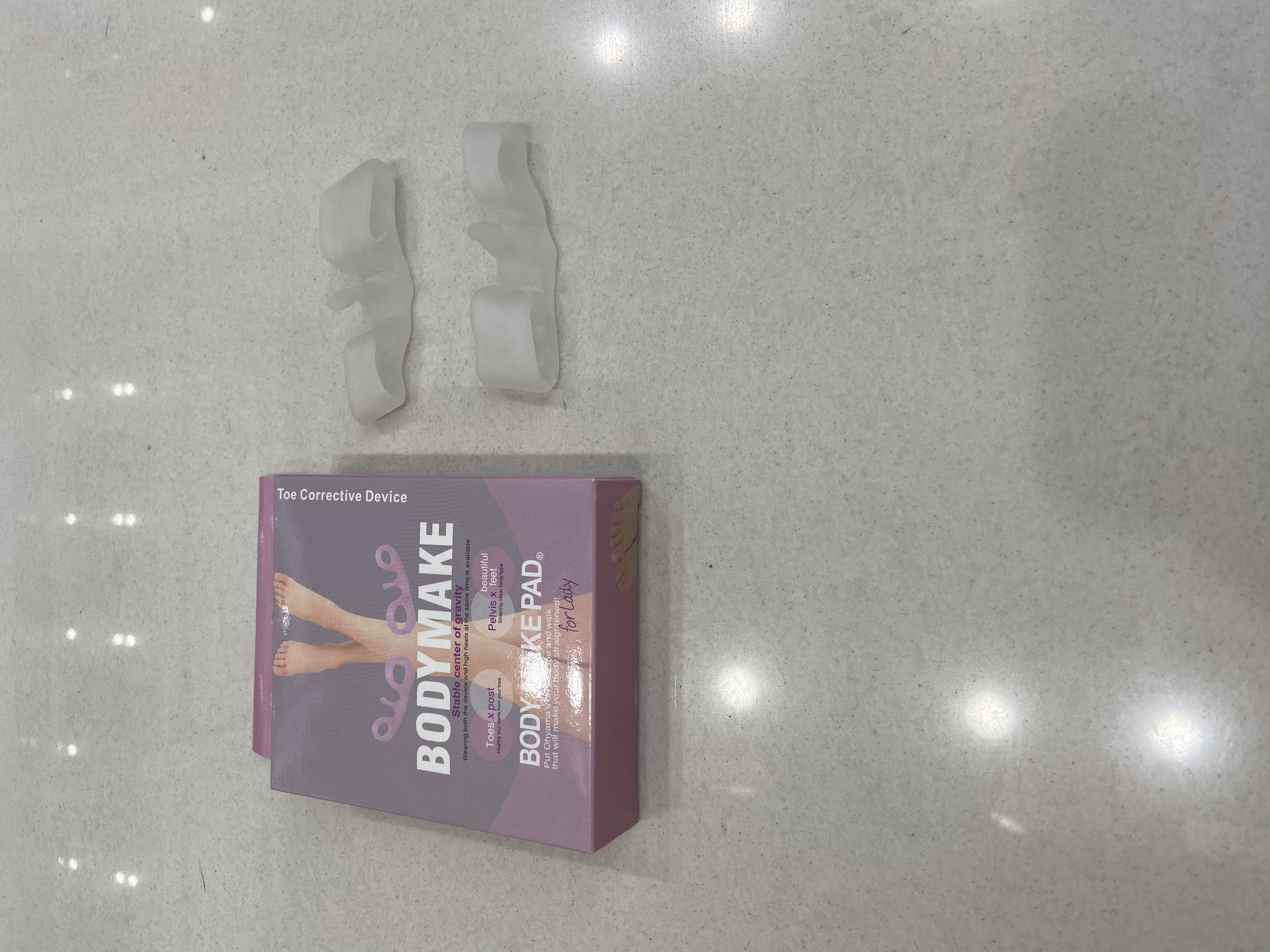 Two hole and one peak toe pad