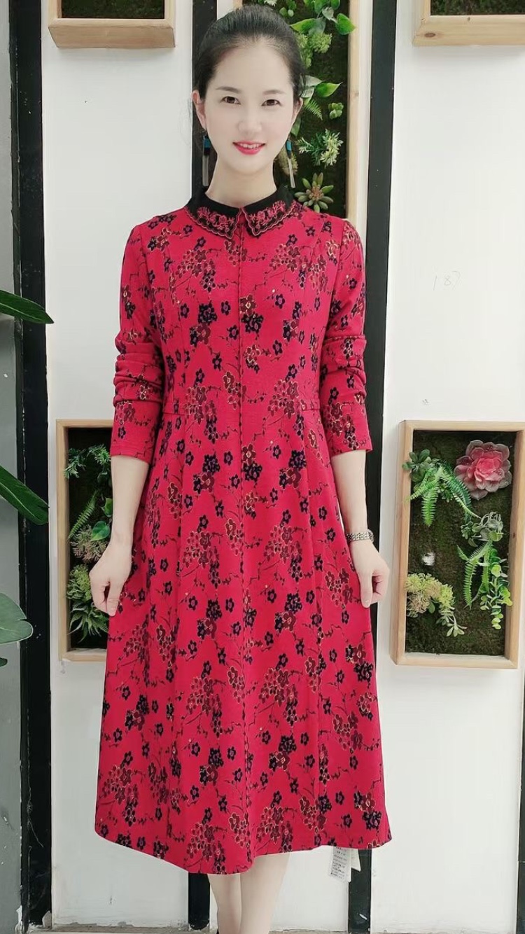 Dress with black flowers on red background