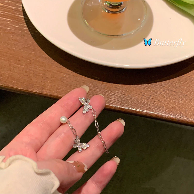 Asymmetrical butterfly earrings 2022 new fashion niche premium design earrings for women stud earrings without ear piercings